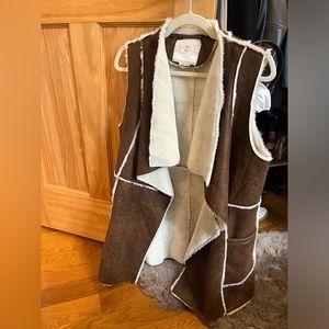 Suede fur lined vest.